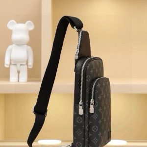 Alternative view of This shoulder bag features Damier Graphite canvas adorned with a Louis Vuitton Paris leather patch on the front exterior pocket. The adjustable nylon shoulder strap attaches to either side via D-rings, while the canvas shoulder strap and lining uphold sustainable principles.Damier Graphite coated canvas Cowhide leather trim Fabric lining Square metal hardware on front Main compartment Zippered front pocket Small zippered top pocket Non-removable, adjustable shoulder strap! Dimensions: 20x31x7cm